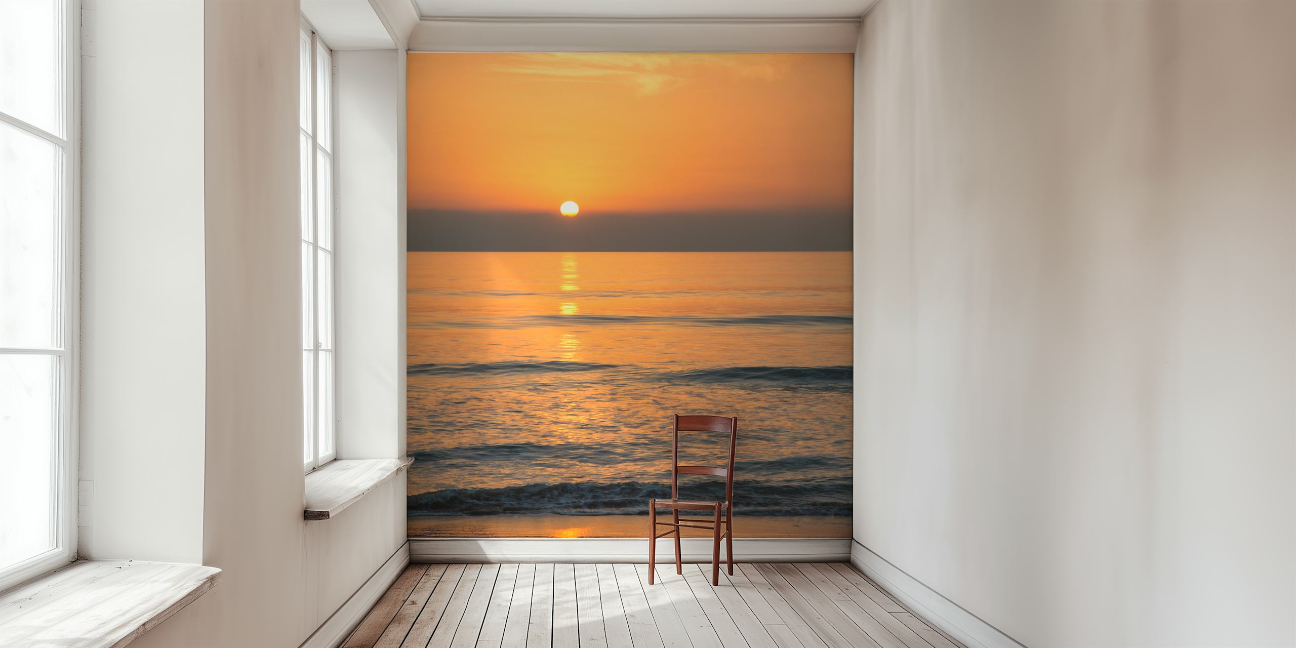 Sunset over water with warm orange hues wallpaper