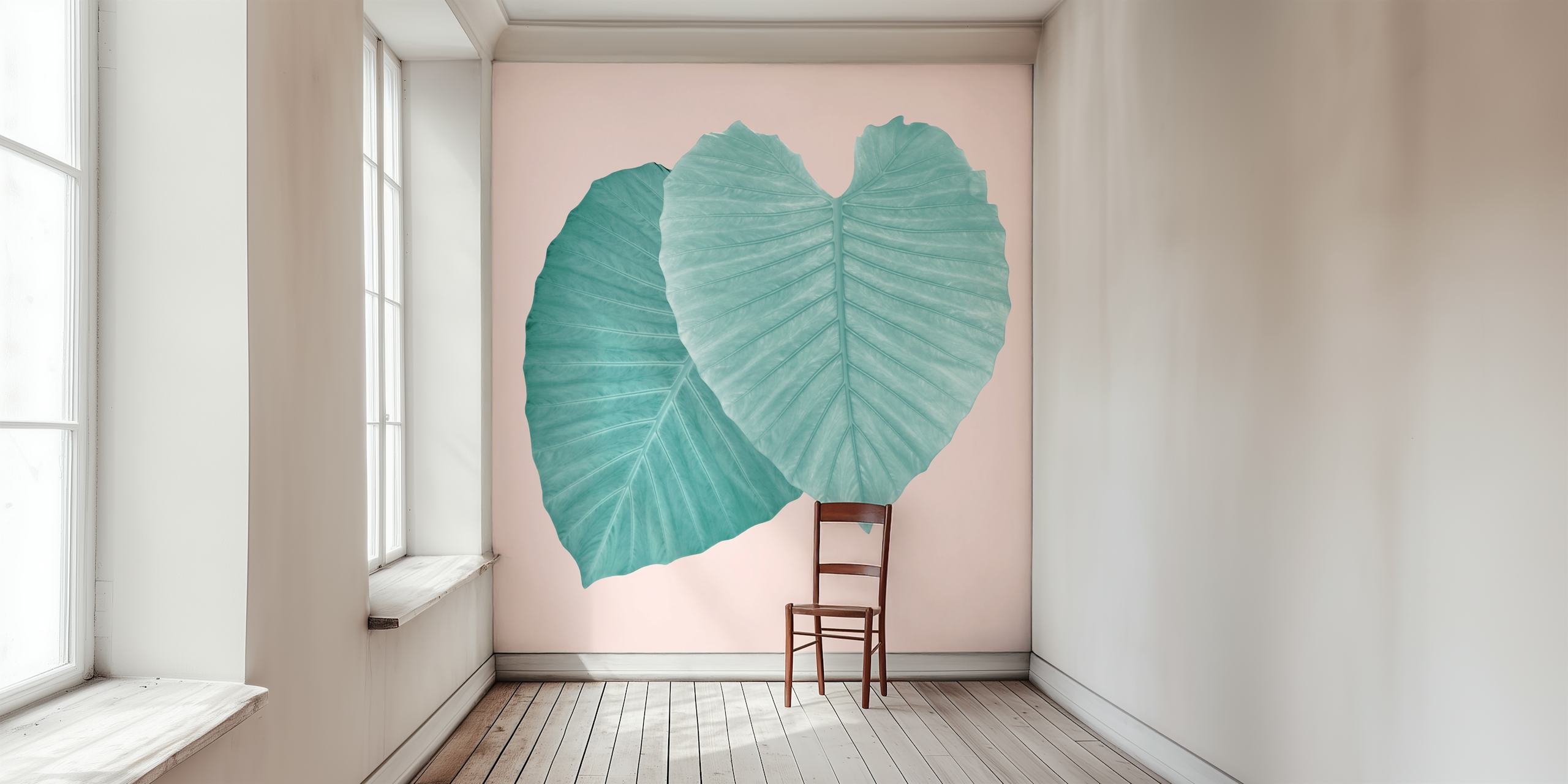 Turkusowe liście tworzące serce na różowej fototapecie w tle