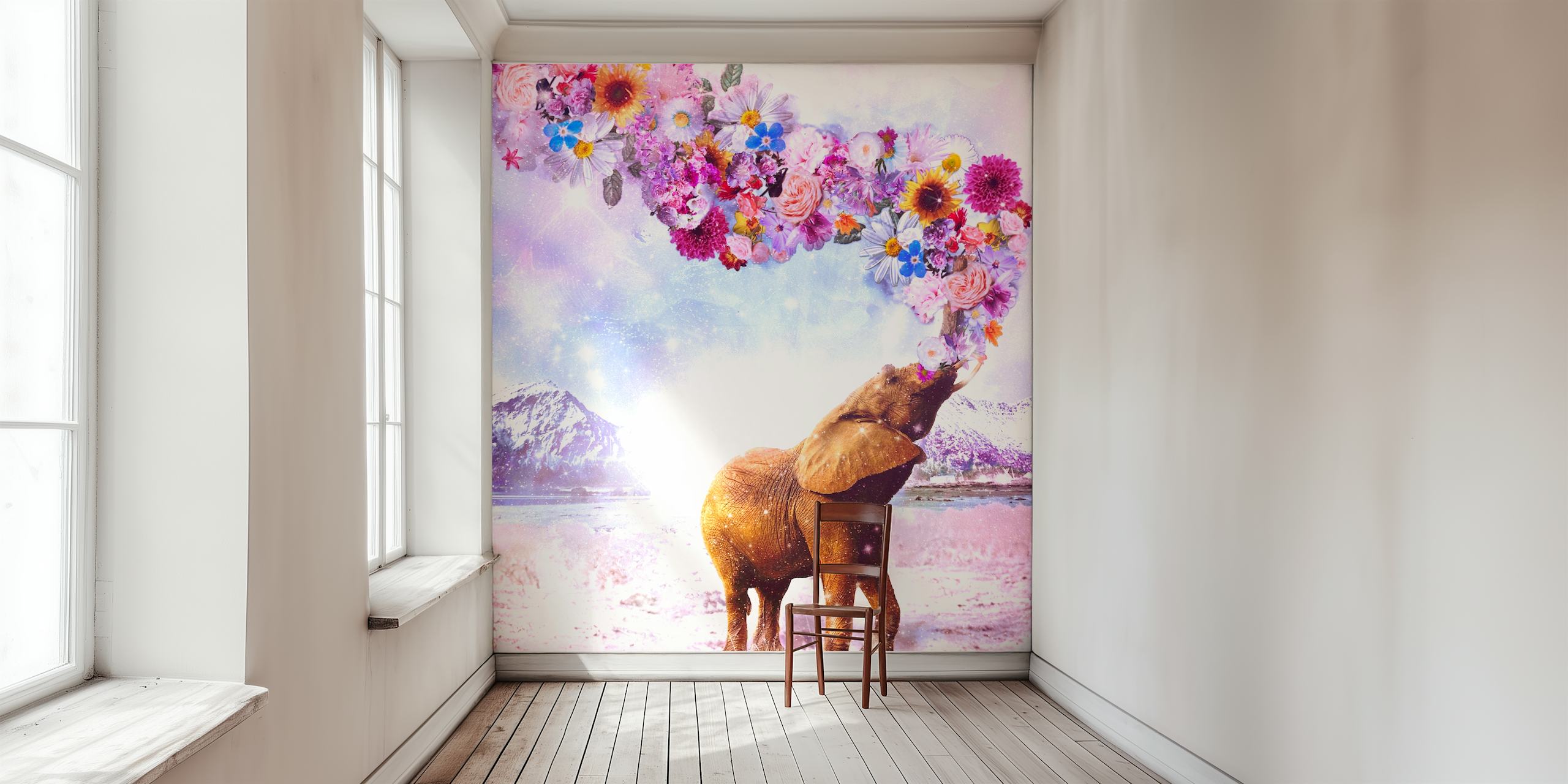 Fototapete Elefant mit Blumenkrone in einer verschneiten Bergkulisse