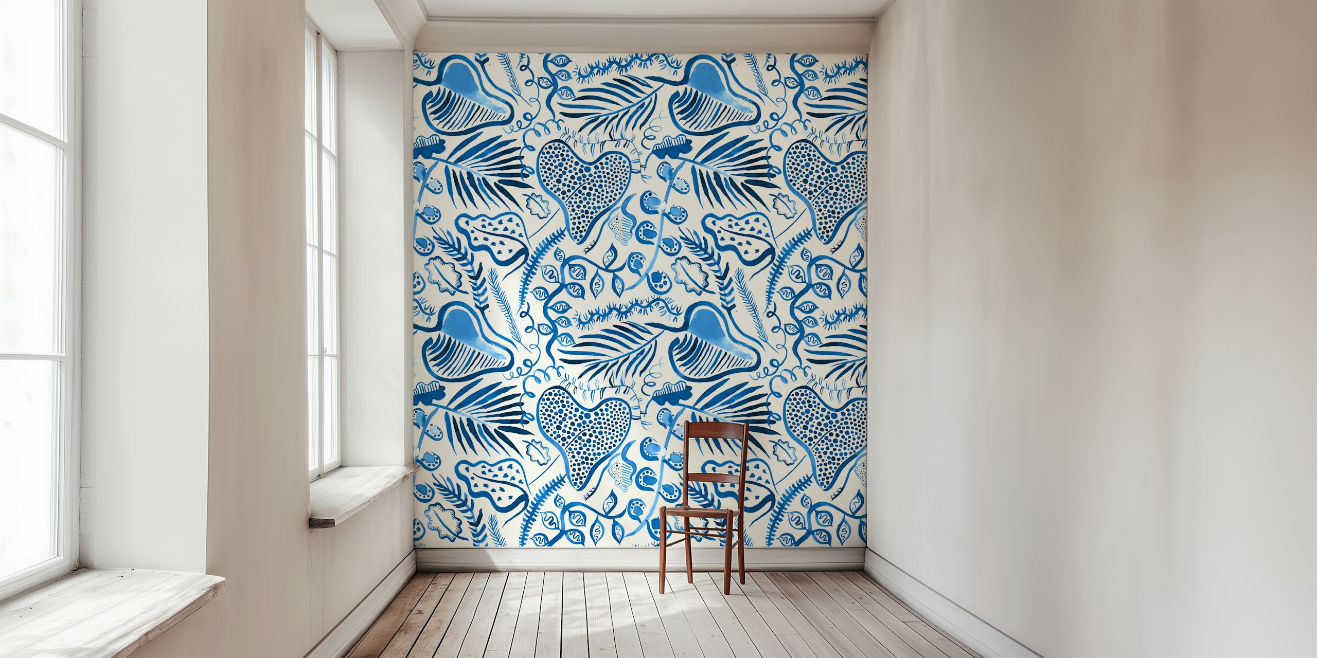 Tropical leaves in blue tones on a light background wallpaper