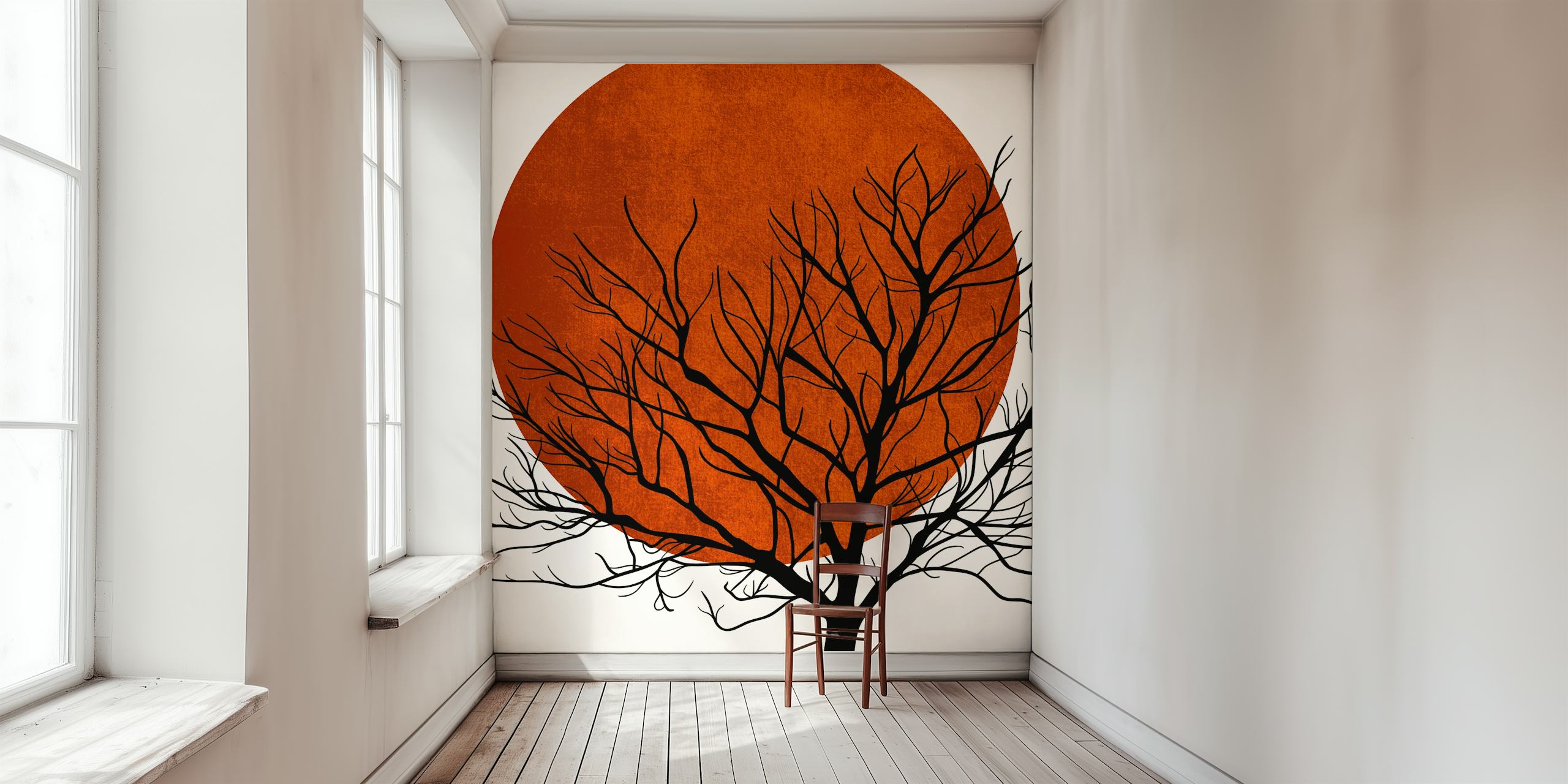 Carta da parati raffigurante la silhouette di un albero spoglio sullo sfondo di un tramonto invernale arancione