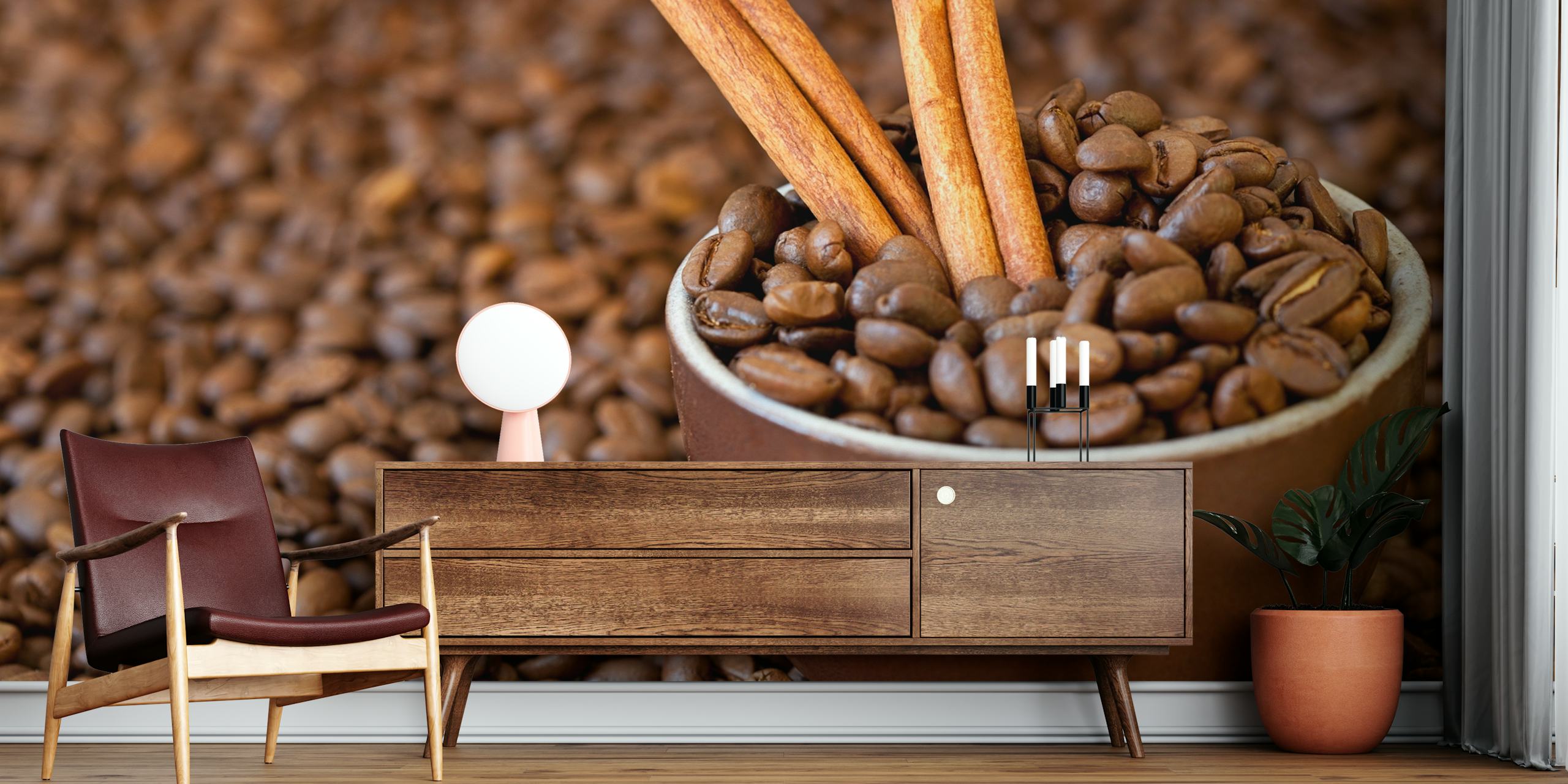 Coffee beans and cinnamon sticks in a bowl wallpaper