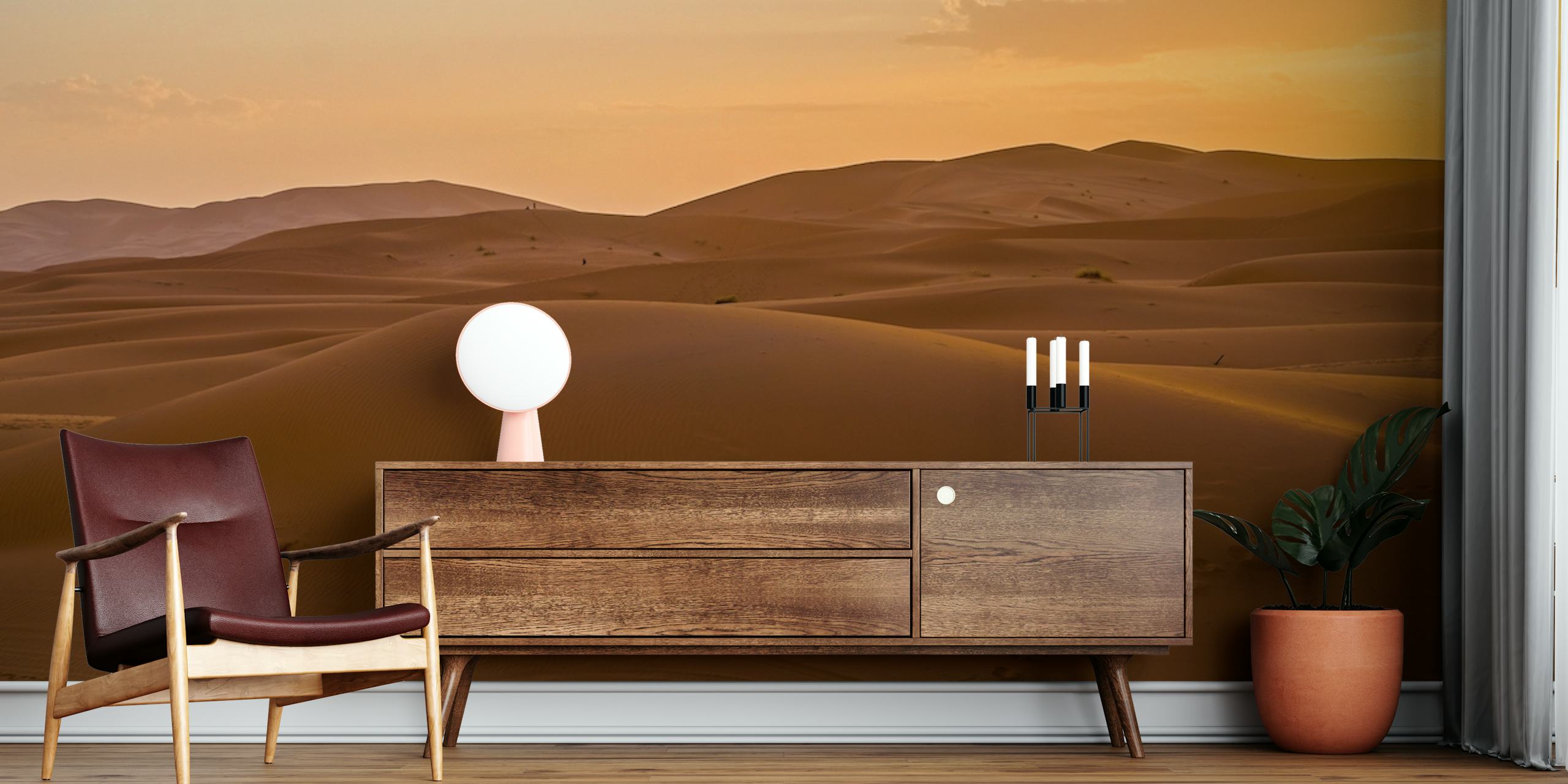 Golden sunset over rolling sand dunes in a Moroccan desert wall mural