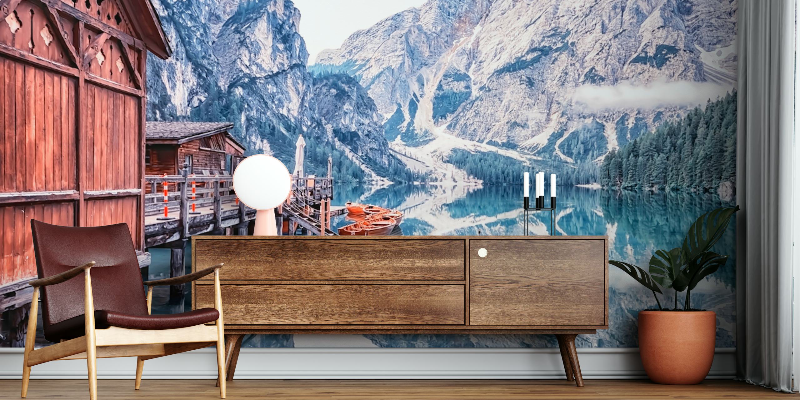 Mountain lake reflection with wooden cabin and boats wallpaper