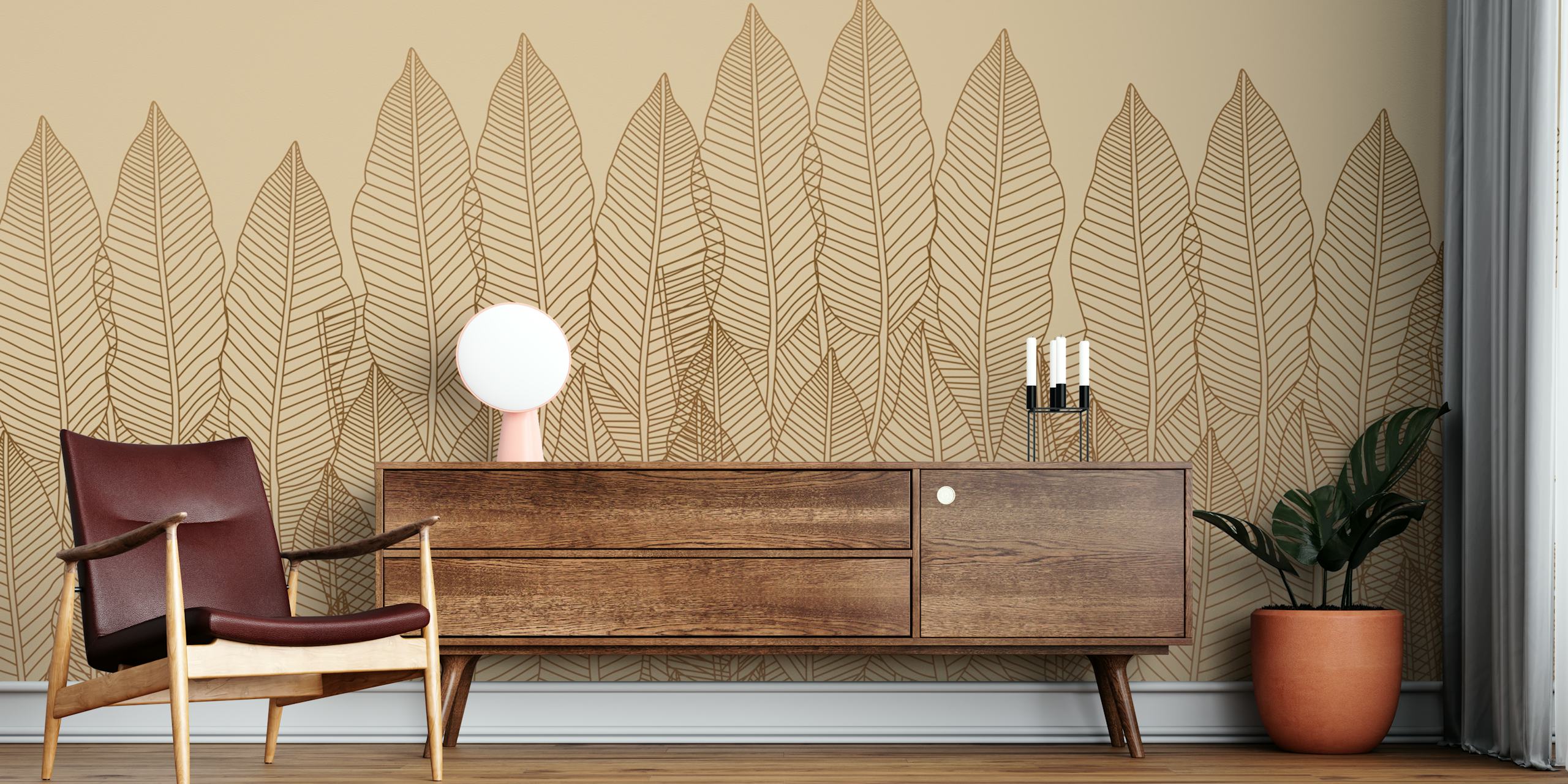 Tropical leaf pattern in gold on beige background wallpaper